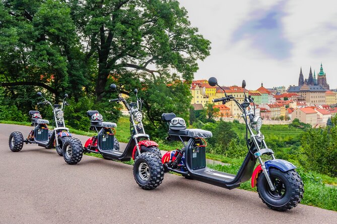 Electric Trike Tour in Prague - City Sightseeing & Fun Riding - Lennon Wall and Charles Bridge beside the river
