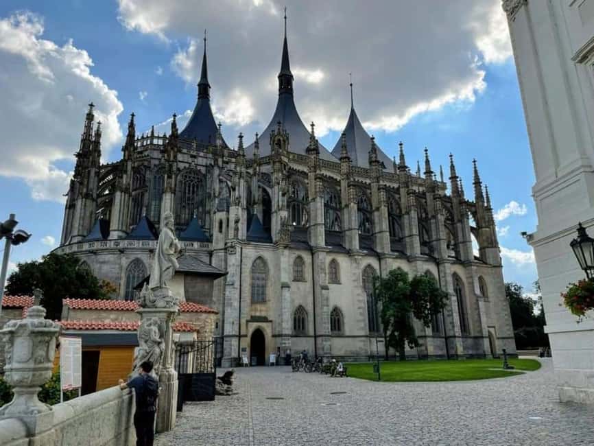 From Prague: Day Trip to Kutna Hora with Czech Lunch - Walking toward St. Barbara’s Church