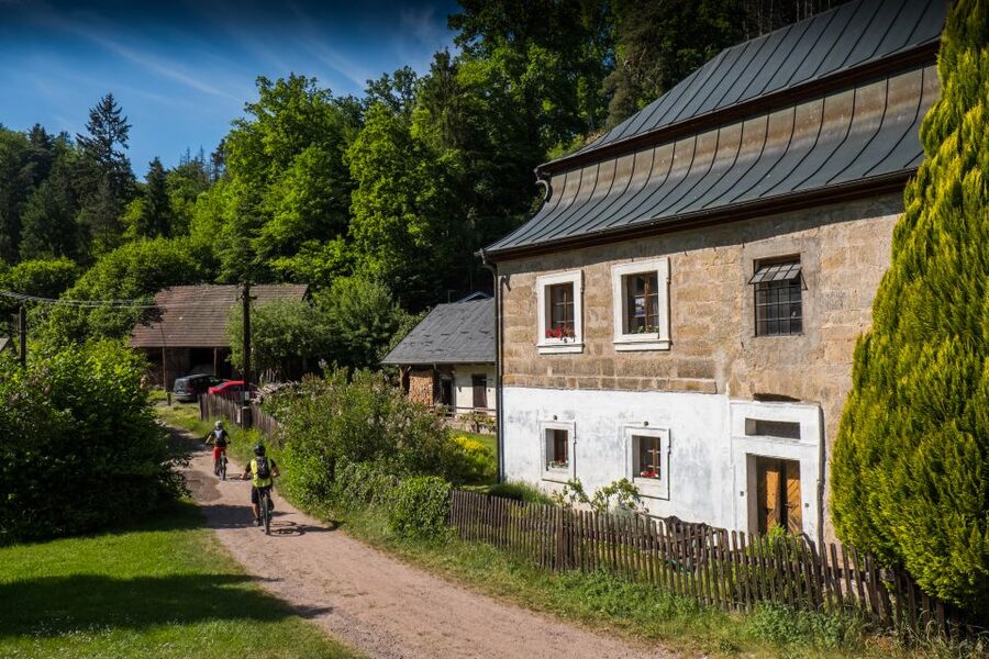 From Prague: E-Mountain Biking Trip to the Bohemian Paradise - A fast descent to Nebakov and lunch by the water