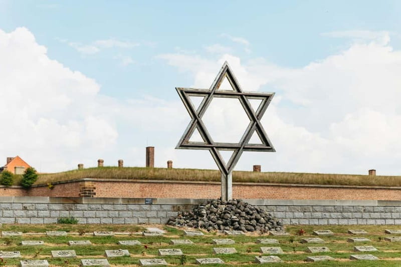 From Prague: Terezin Concentration Camp Guided Tour w/ Audio - The one-hour bus ride and its audio introduction