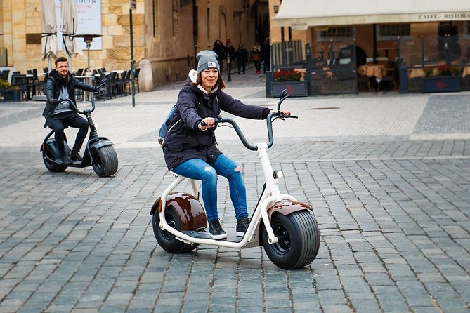 Grand city tour on Scrooser in Prague - From the Gothic Trade Ministry to Letná’s river views