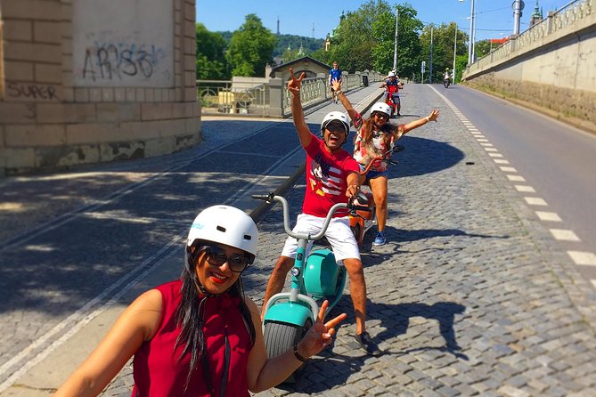 Grand city tour on Scrooser in Prague - Lennon Wall and the final ride through Lesser Town
