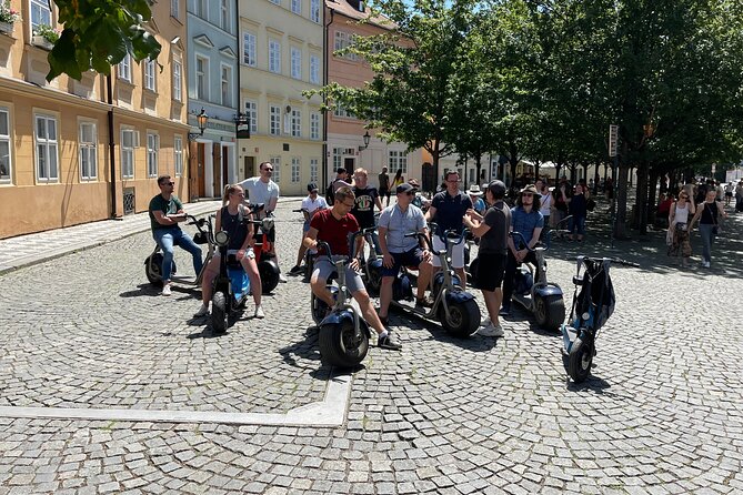 Guided sightseeing e-scooter tour of Prague: 2 hours - Starting at Uhelný trh and learning the scooter