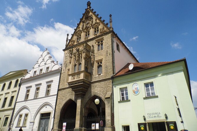Kutna Hora and Bone Chapel Private Day Trip from Prague - Jesuit College, statues, and Kutná Hora’s religious shift