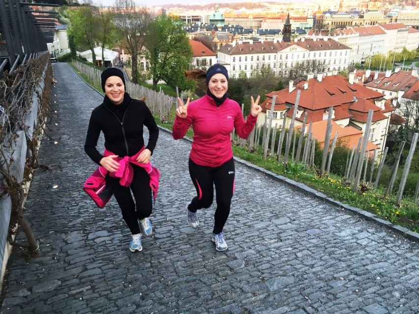 Prague 1.5-Hour Compact City Center Running Tour - Crossing Charles Bridge while the city opens up
