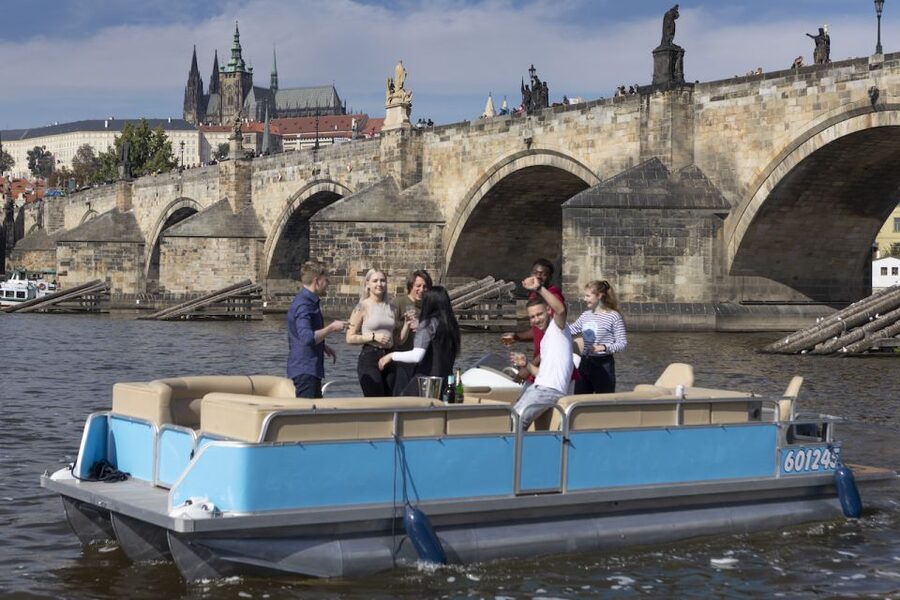 Prague: Beer Boat Tour - Setting off between two Prague river landmarks