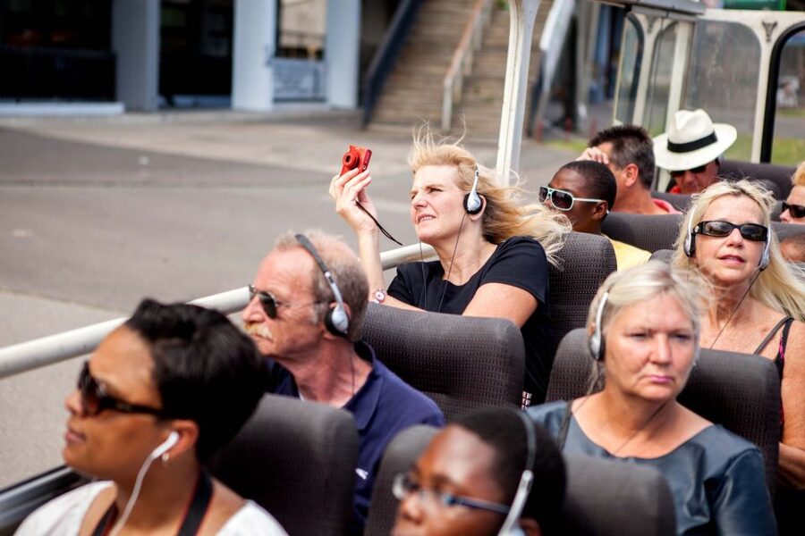Prague: City Sightseeing HOHO Bus Tour & Optional Boat Tour - Audio commentary, guides, and onboard comfort