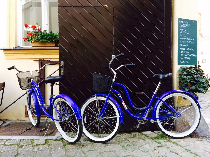 Prague Electric Bike Rental - Crossing the Vltava beside Charles Bridge
