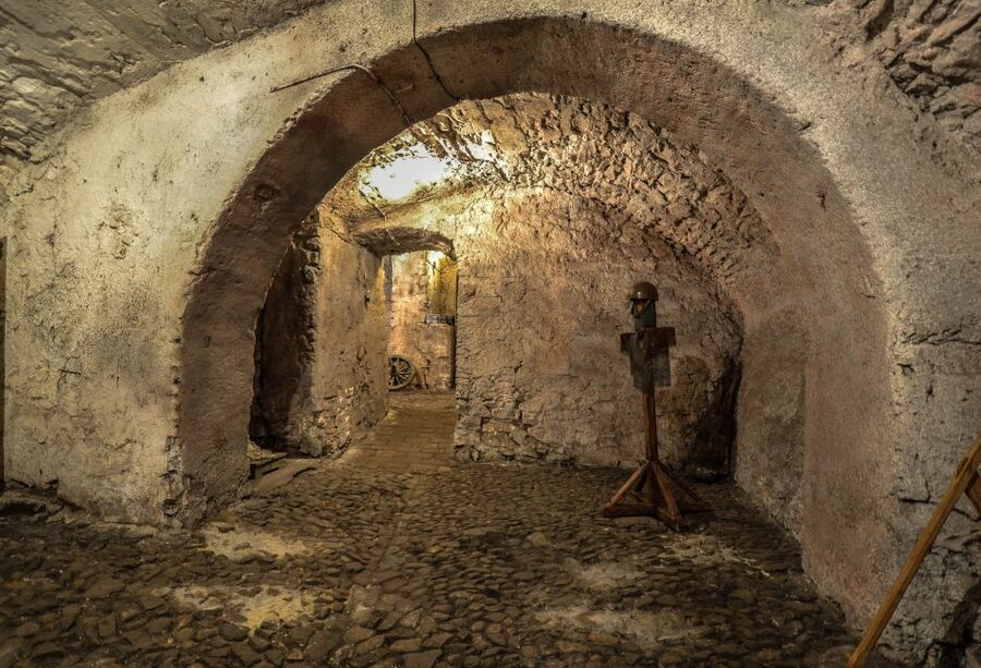 Prague: Ghosts, Legends, Medieval Underground & Dungeon Tour - Going underground into Prague’s medieval past