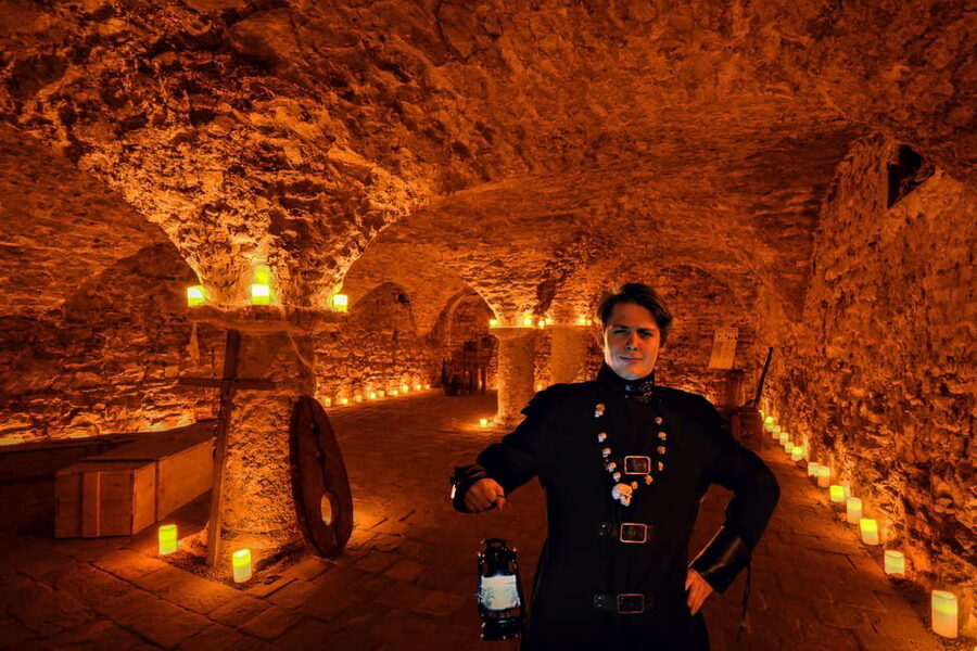 Prague: Ghosts, Legends, Medieval Underground & Dungeon Tour - Old Town stories from the square to Kozí Street