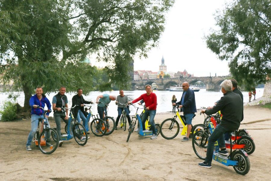 Prague: Grand Segway and eScooter Live Guided City Tour - Riding up to Prague Castle