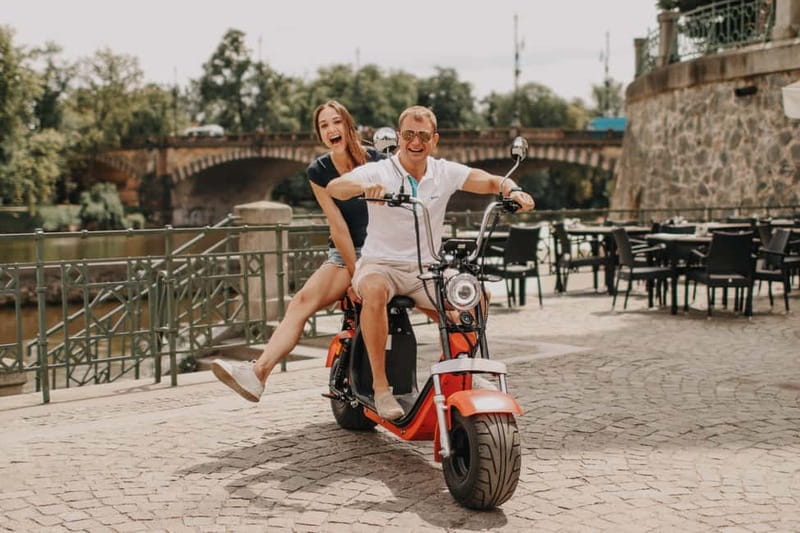 Prague: Guided Fat Tire e-Scooter Tour - Prague Castle and the old Strahov Monastery