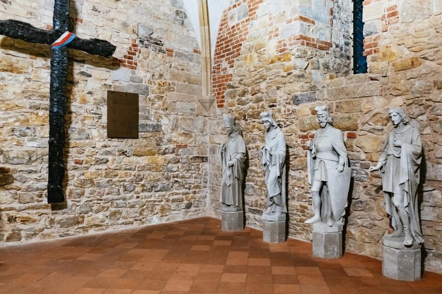 Prague: Old Town, Astronomical Clock and Underground Tour - Crossing Charles Bridge with stories attached