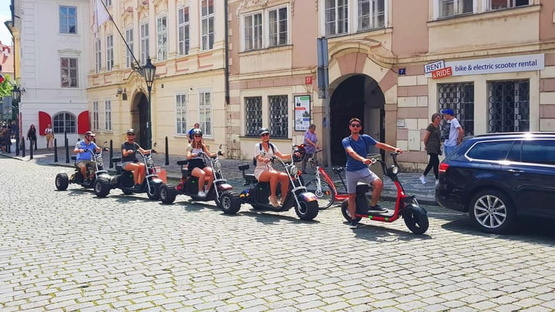 Prague: Panoramic Viewpoints Guided Electric Tricycle Tour - Kafka, a narrow street, and old central Prague