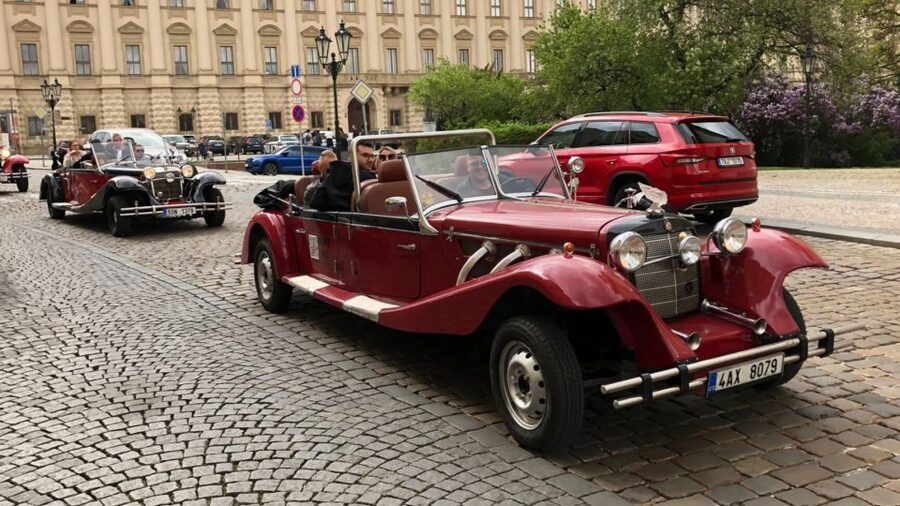 Prague: Private Tour by Vintage Car - Crossing toward Prague Castle and Hradčany
