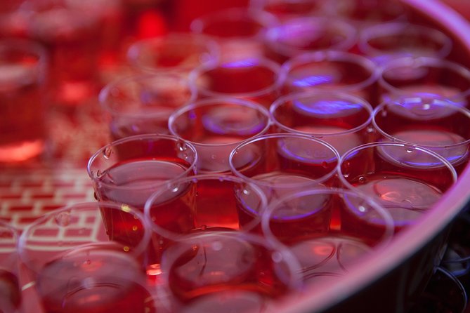 Prague Pub Crawl with Unlimited Drinks & 5 story club Entry - Walking Through Central Prague After Dark