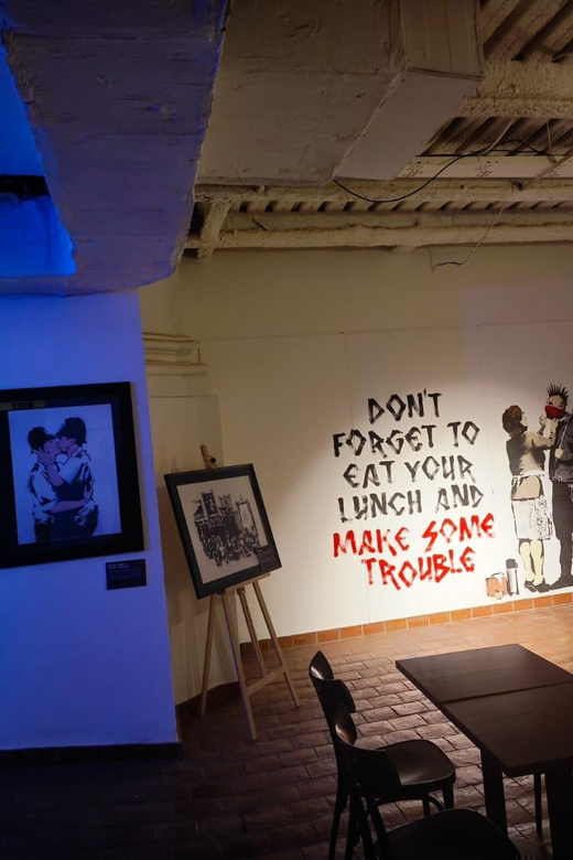 Prague: The World of Banksy Immersive Experience Ticket - Seeing Girl with Balloon and the familiar Banksy images