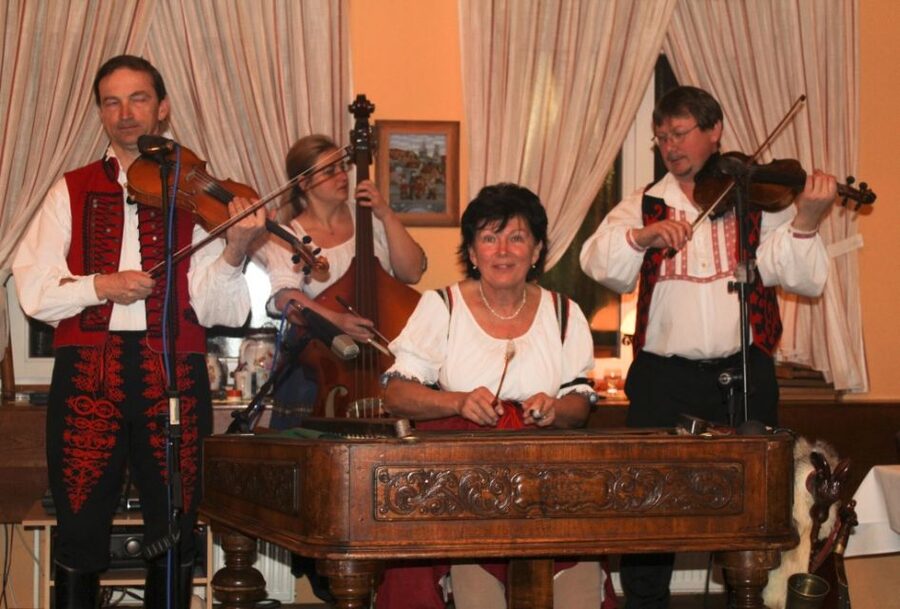 Prague: Traditional Folklore Evening with Dinner & Music - Settling in for Czech dinner