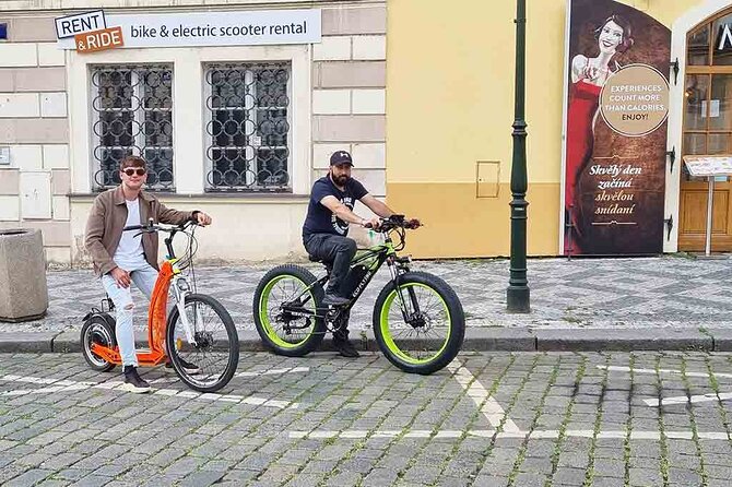 Prague Trike & e-Scooter Tour: Castle Viewpoints & Charles Bridge - Petrín Park and the ride back