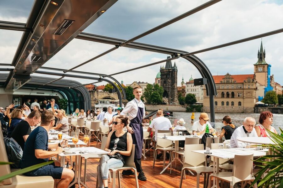 Prague: Vltava River Lunch Cruise in an Open-Top Glass Boat - A welcome aperitif and a comfortable glass boat