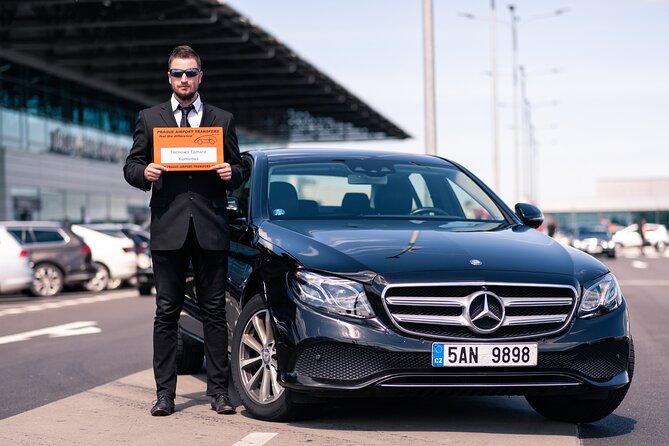 Private Arrival Transfer: Prague Airport - Arriving at Václav Havel Airport with a name board
