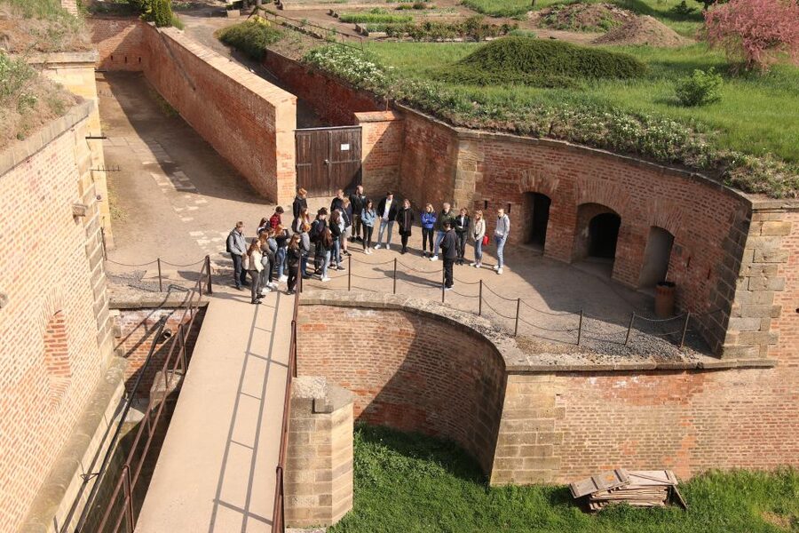Terezin Memorial: Entry Ticket Combo w. Guided Walking Tour - Walking from the prison to the former ghetto